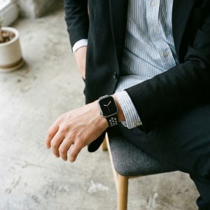Model wearing Black/White Sport Band Active for Apple Watch Apple Watch band