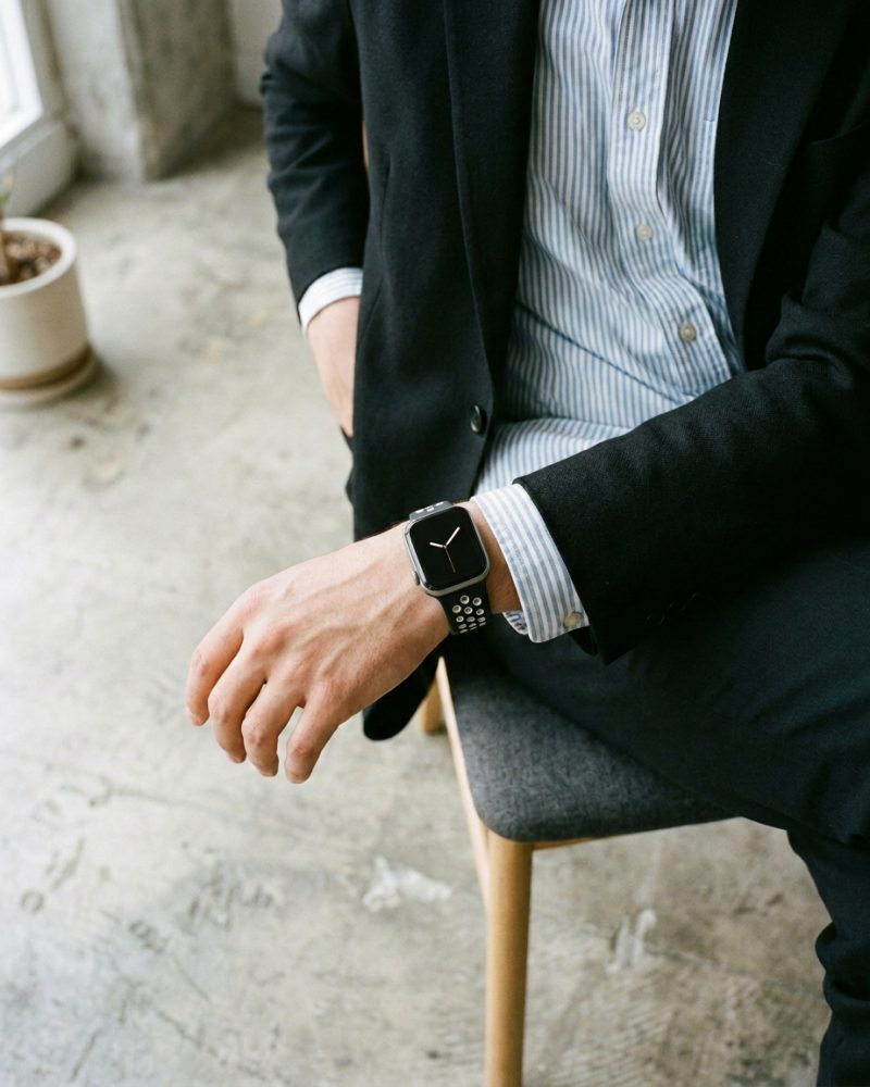 Model wearing Black/White Sport Band Active for Apple Watch Apple Watch band