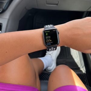 Model wearing Black/White Sport Band Active for Apple Watch Apple Watch band
