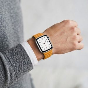 Model wearing California Poppy Leather Link Band for Apple Watch Apple Watch band