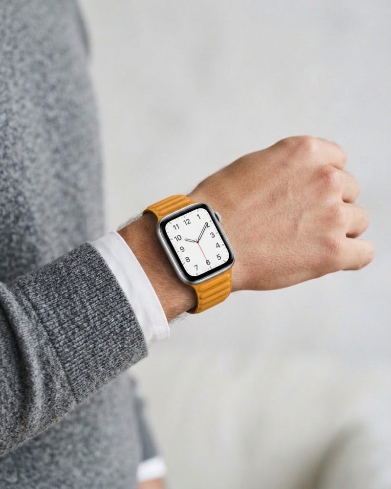 Model wearing California Poppy Leather Link Band for Apple Watch Apple Watch band