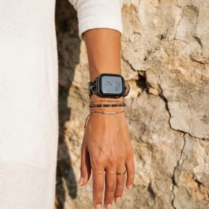 Model wearing Dakota Hybrid Steel Leather Band for Apple Watch in Black and Black Leather Apple Watch band