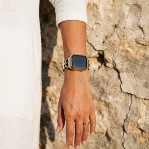 Model wearing Dakota Hybrid Steel Leather Band for Apple Watch in Gold and Black Leather Apple Watch band