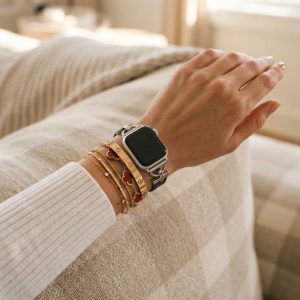 Model wearing Dakota Hybrid Steel Leather Band for Apple Watch in Silver and Black Leather Apple Watch band