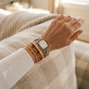 Model wearing Dakota Hybrid Steel Leather Band for Apple Watch in Silver and Brown Leather Apple Watch band
