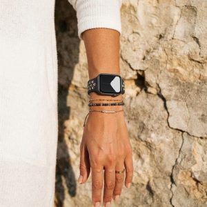 Model wearing Desert Sand/Black Sport Band Active for Apple Watch Apple Watch band