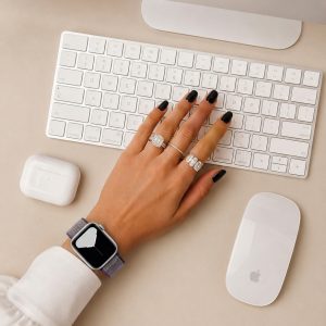 Model wearing Desert Sand Sport Loop For Apple Watch Apple Watch band