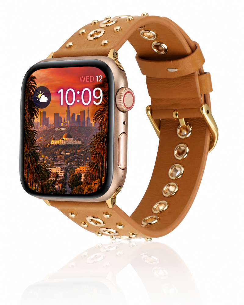 Model wearing Elektra Leather Band with Gold Rivets for Apple Watch in Brown Apple Watch band