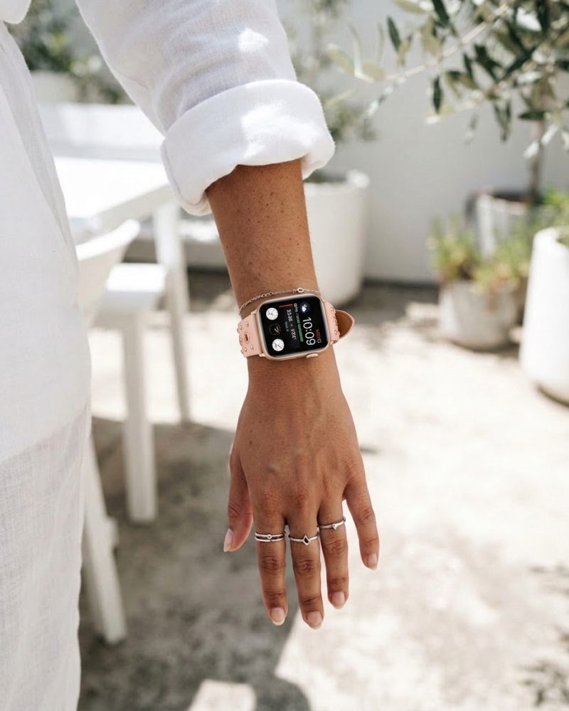 Model wearing Elektra Leather Band with Rose Gold Rivets for Apple Watch in Pink Apple Watch band