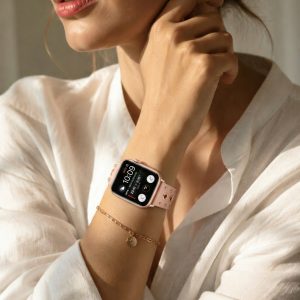 Model wearing Elektra Leather Band with Rose Gold Rivets for Apple Watch in Pink Apple Watch band
