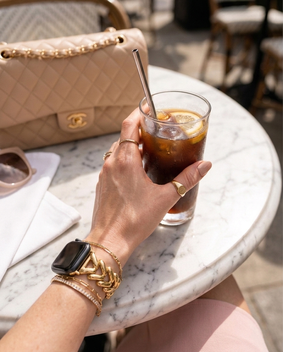 Model wearing Herringbone Stainless Steel Band for the Apple Watch in Gold Apple Watch band