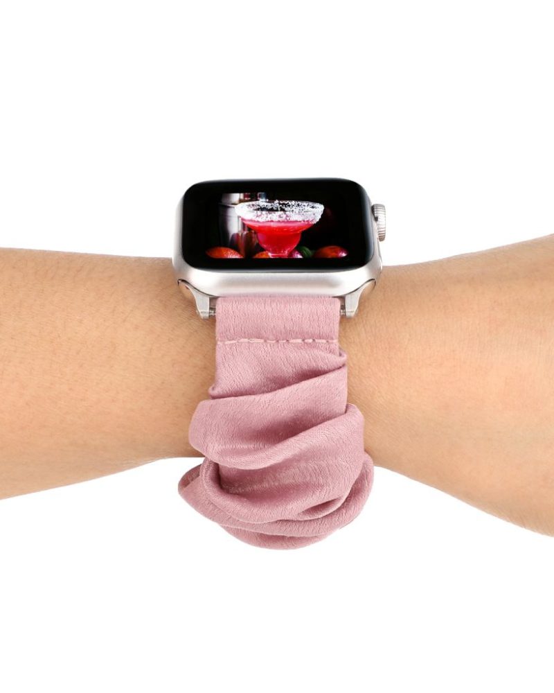 Light pink shimmer scrunchie loop band for Apple Watch on wrist