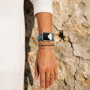 Model wearing Midnight Turquoise/Aurora Green Sport Band Active for Apple Watch Apple Watch band