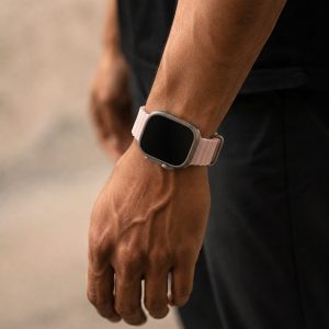 Model wearing Ocean Band for Apple Watch – Pink Sand Apple Watch band