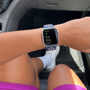 Model wearing Ocean Blue/Light Pink Sport Band Active for Apple Watch Apple Watch band