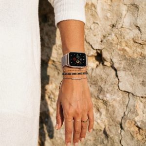 Model wearing Pink Sand Sport Loop For Apple Watch Apple Watch band