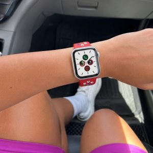 Model wearing Red/Rainbow Pride Sport Band Active for Apple Watch Apple Watch band