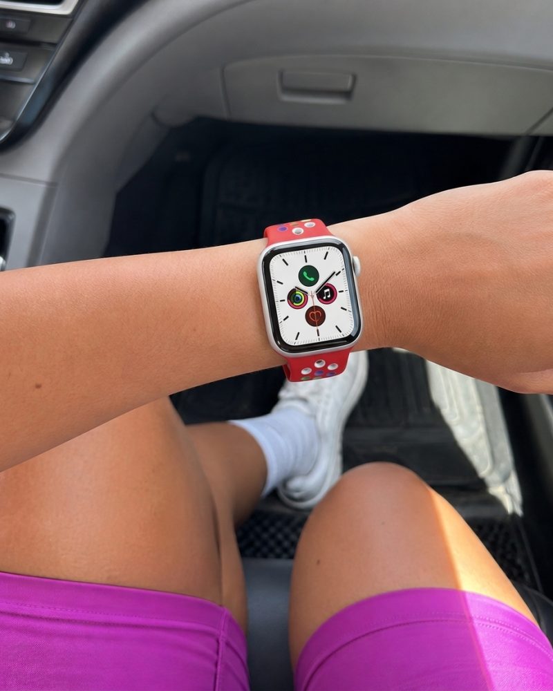 Model wearing Red/Rainbow Pride Sport Band Active for Apple Watch Apple Watch band
