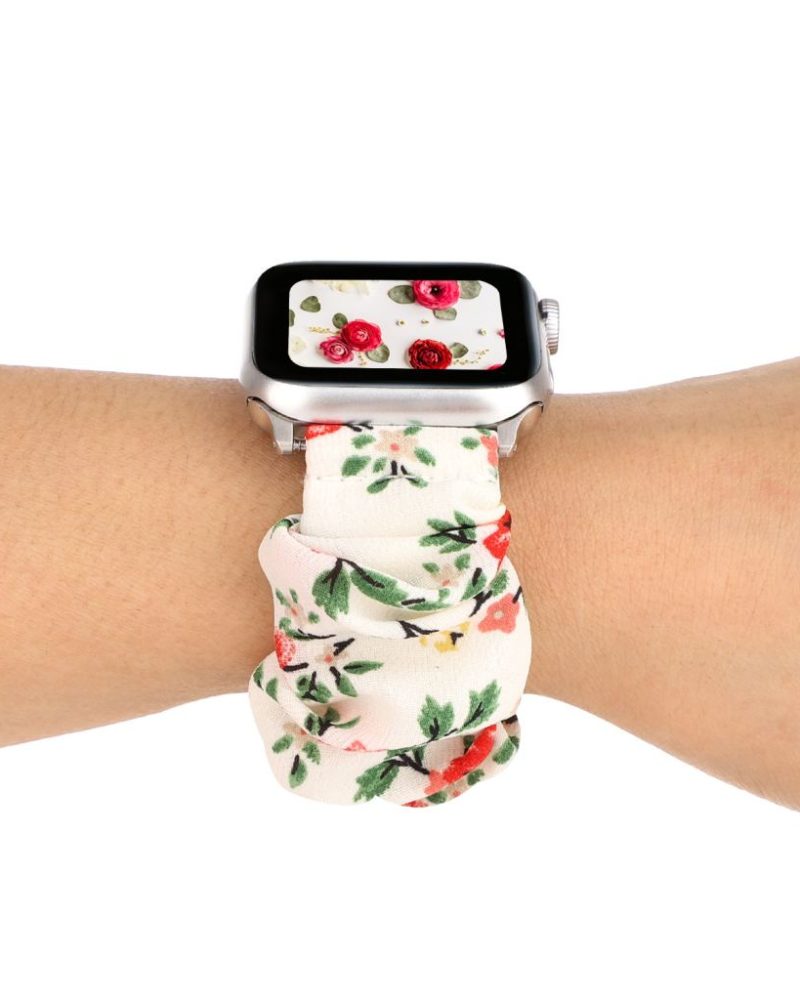 Rose floral scrunchie loop band for Apple Watch on wrist, white fabric with pink and red flowers
