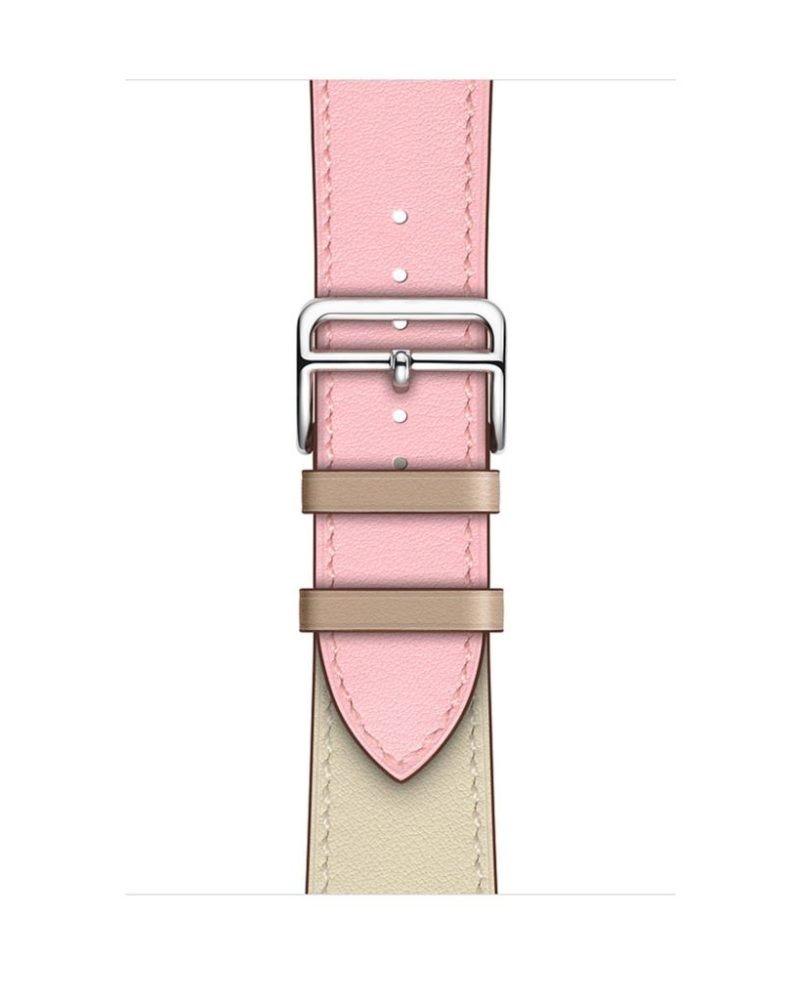 Rose pink leather Apple Watch band with silver buckle and tan keeper loops
