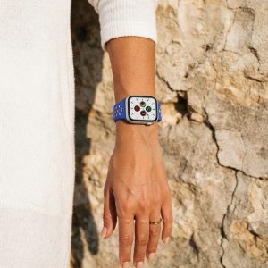 Model wearing Royal Blue/Rainbow Pride Sport Band Active for Apple Watch Apple Watch band