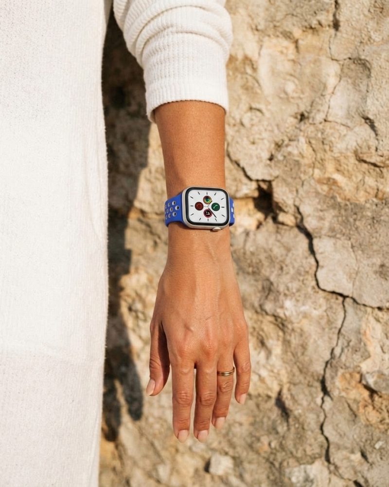 Model wearing Royal Blue/Rainbow Pride Sport Band Active for Apple Watch Apple Watch band