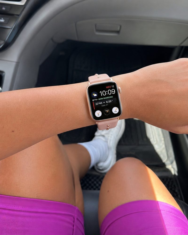 Model wearing Shakira Leather Band with Gold Studs for Apple Watch in Pink Apple Watch band