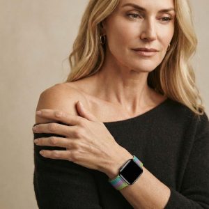 Model wearing Stripe Bright Green With Purple And White Lake Blue Milanese Loop For Apple Watch Apple Watch band