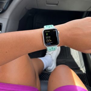 Model wearing Teal Tint/Tropical Twist Sport Band Active for Apple Watch Apple Watch band