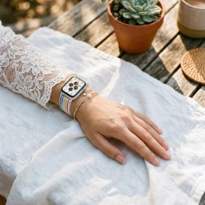 Model wearing White Rainbow Pride Elastic Loop Band for Apple Watch Apple Watch band