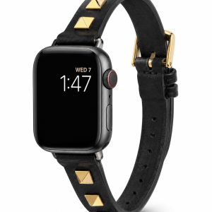 Model wearing Rockstar Slim Leather Band with Gold Studs for Apple Watch in Black Apple Watch band