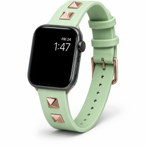 Model wearing Rockstar Slim Leather Band with Gold Studs for Apple Watch in Light Green Apple Watch band