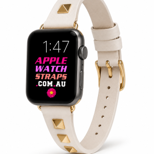 Model wearing Rockstar Slim Leather Band with Rose Gold Studs for Apple Watch in Cream Apple Watch band