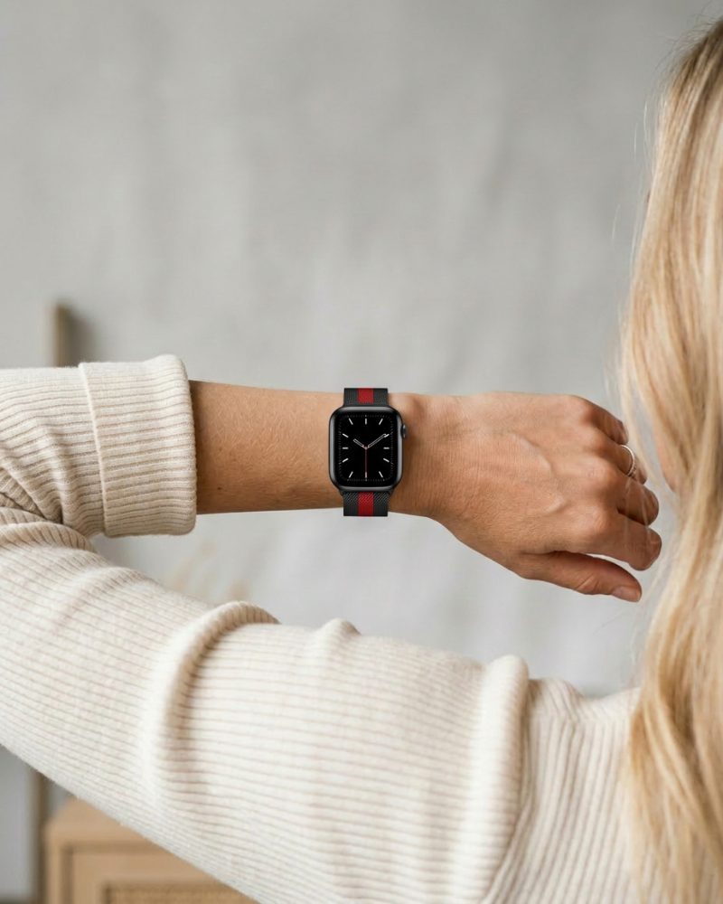 Model wearing Stripe Black Red Black Milanese Loop for Apple Watch Apple Watch band